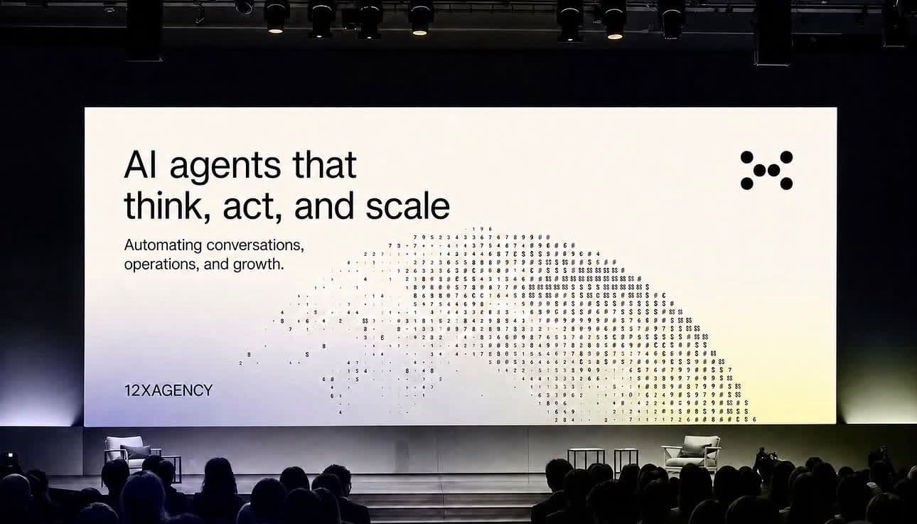 12X Agency presentation about AI agents on a conference stage